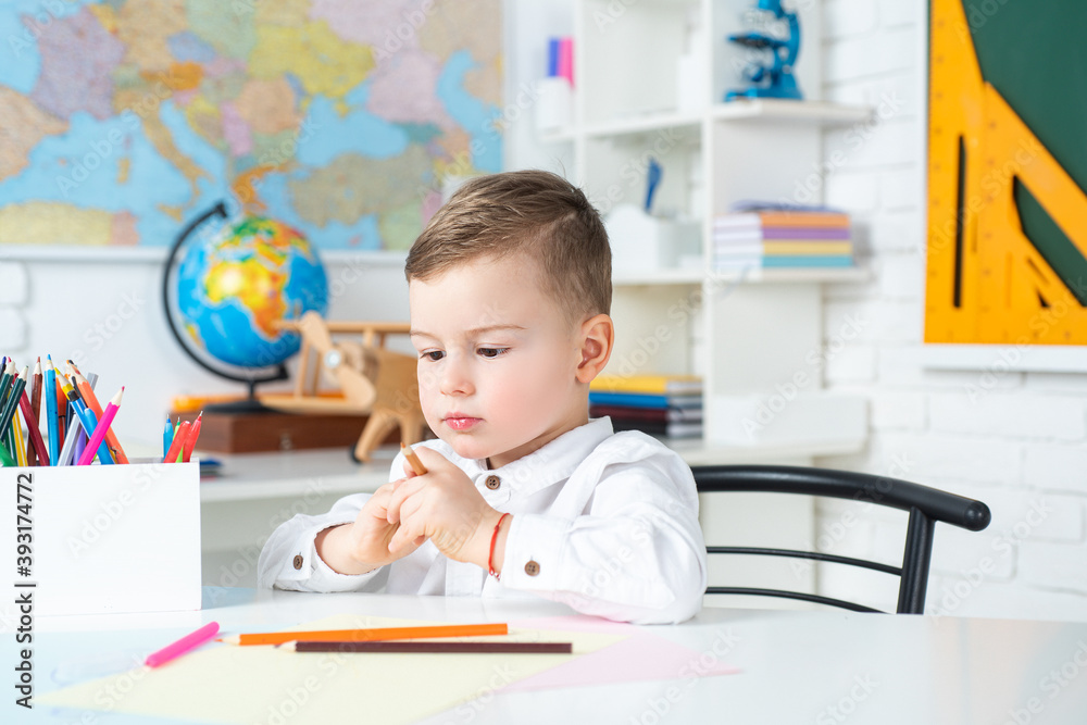 Elementary school boy. Concept of education and reading. Pupil in class. Elementary school boy. Concept of education and reading. Pupil in class.