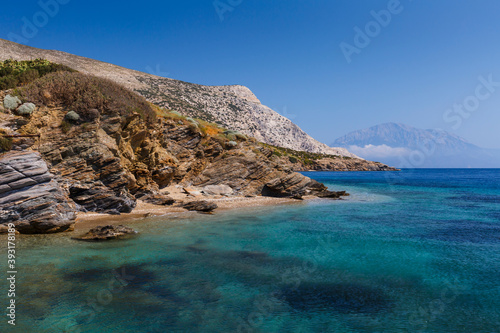 Kamari beach on Fourni island and view of Samos island in the distance photo