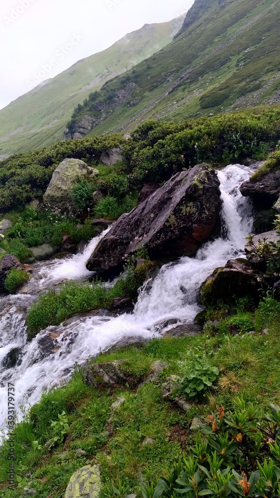 waterfall in the mountains waterfall in the mountains