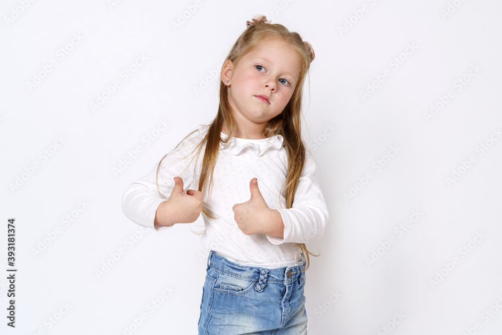 The girl shows a gesture - class. Isolated over white background. The girl shows a gesture - class. Isolated over white background.