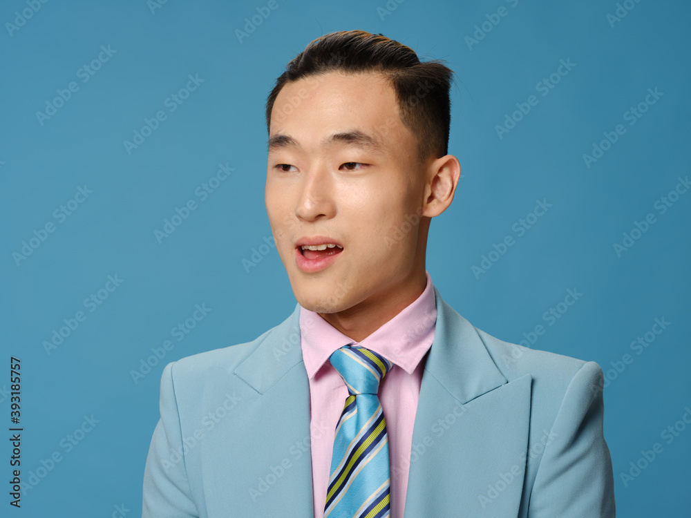 Handsome young man in suit smiling Asian appearance business Handsome young man in suit smiling Asian appearance business