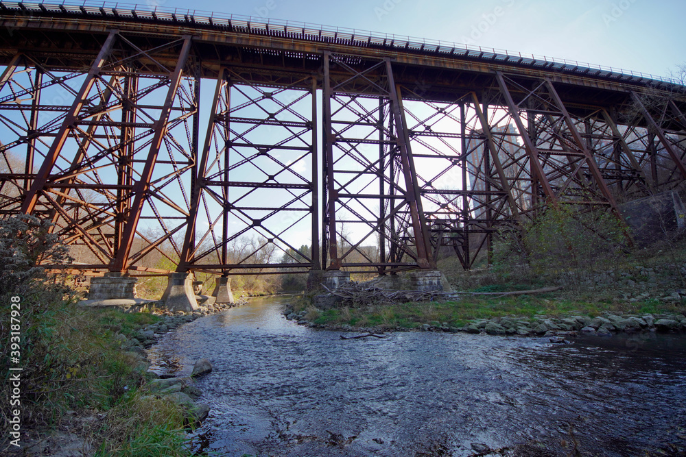 An iron train bridge passes though the Don Valley in Toronto.