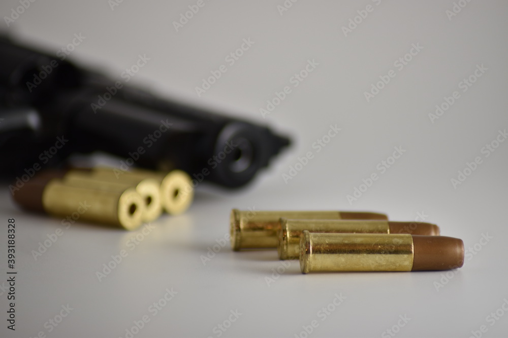 close-up of an airsoft revolver with ammunition close-up of an airsoft revolver with ammunition