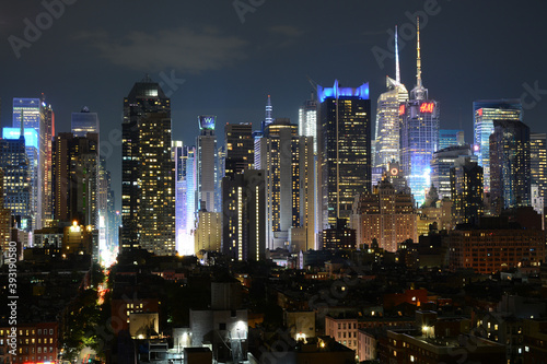 New York, NY, USA - June 29, 2019: Night Manhattan view from The Press Lounge