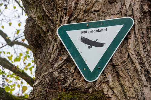 Signboard with the inscription Natural Monument in German language