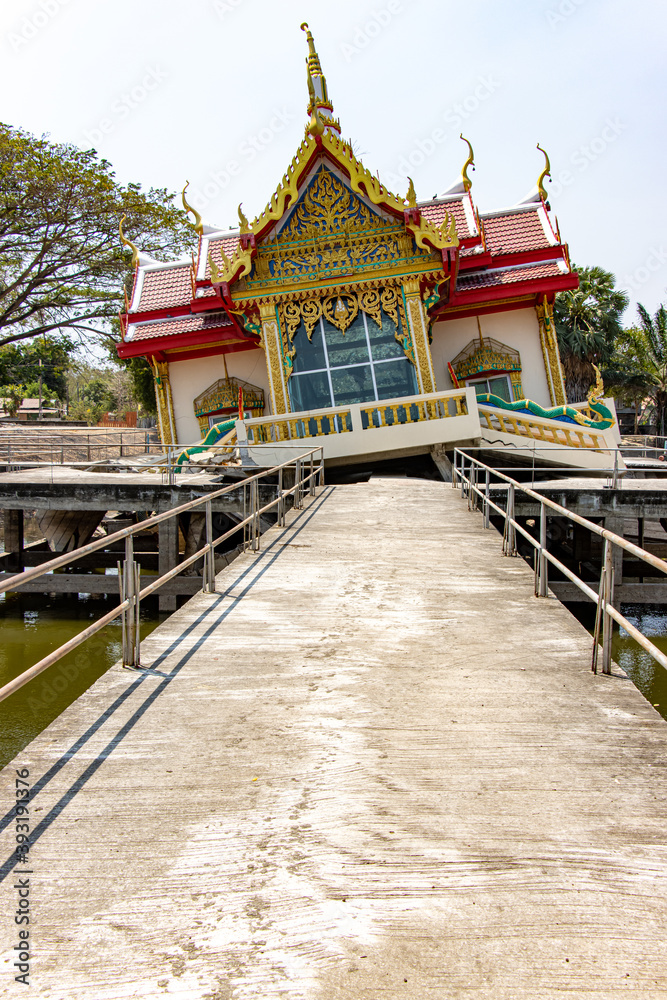 The way to Buddhist temple Wat Khao Saphan Park fall down inside a concrete construction in water tank, Thailand.