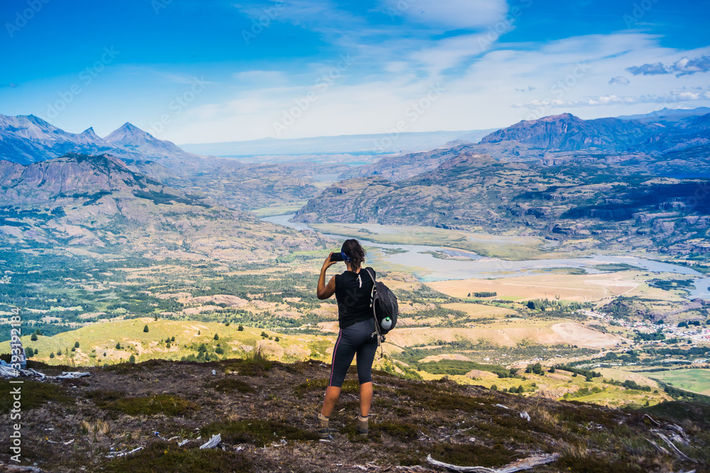 Woman enjoy the view by the Cerro Castillo landscape at Patagonia.