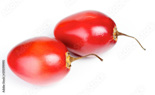 Close up of tamarillo on white background photo