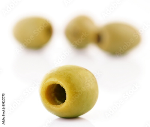Close up of olives on white background