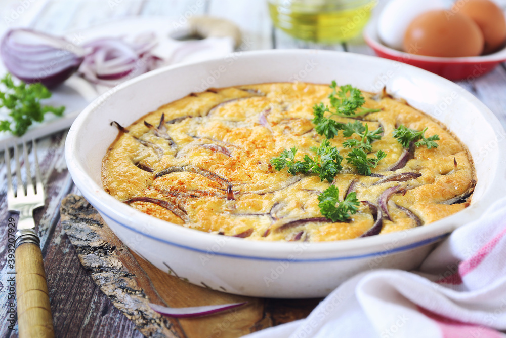 Red onion omelet and ingredients, parsley garnish Red onion omelet and ingredients, parsley garnish