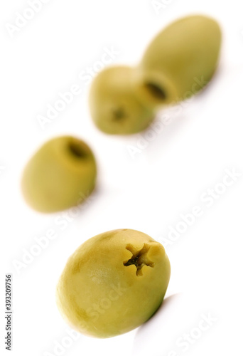 Olives on white background - close-up