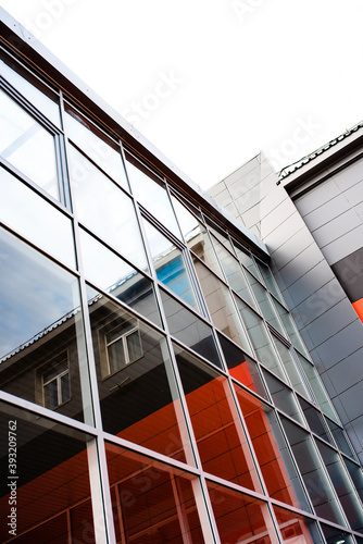 Glass cladding panels and windows of modern buildings. Geometry and Perspective