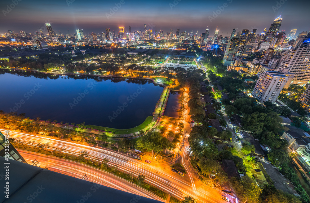 Panoramic View of Bangkok, Thailand. Cityscape with Public Park and Skyscrapers at Twilight
