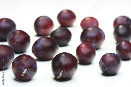 Plums on white bacground - close-up