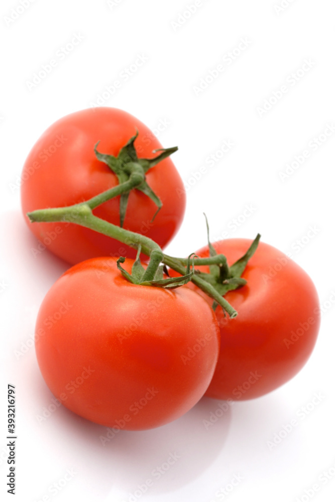 Close-up of tomatoes on white background