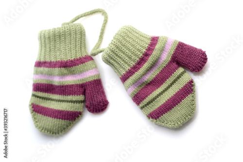 Baby gloves on white background