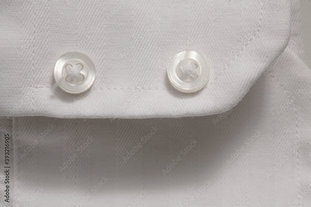Close-up of buttons on cloth Close-up of buttons on cloth
