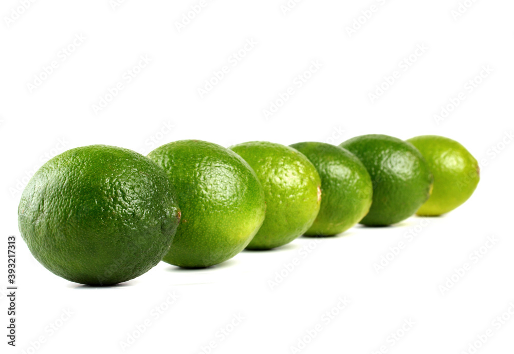 Limes on white background - studio shot Limes on white background - studio shot