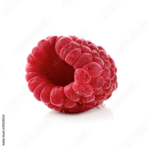 Frozen raspberry on white background