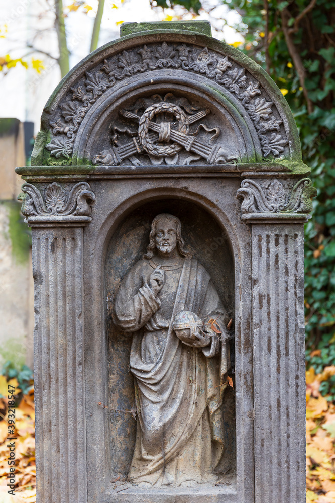 Historic Statue on the autumn mystery old Prague Cemetery, Czech Republic Historic Statue on the autumn mystery old Prague Cemetery, Czech Republic