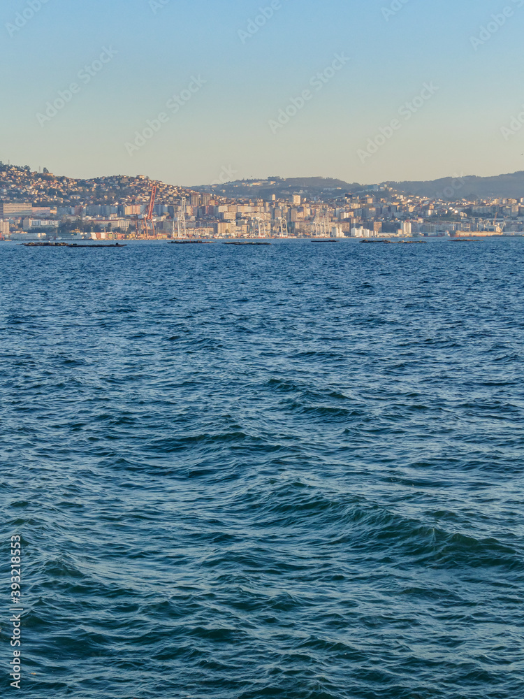 seascape with vigo in the background on a sunny day vertical