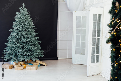 Christmas tree blue pine with gifts interior new year