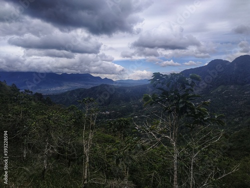 time clouds over the mountains photo