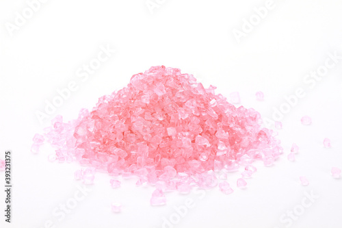 Konstfotografi Pile of pink bath salt isolated on a white background