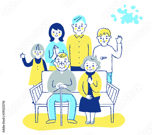 ベンチに座る老夫婦と家族