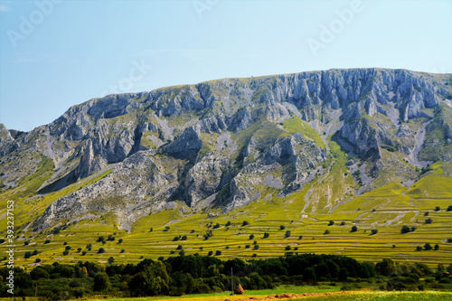 Shot of a scenic landscape with the Piatra Secuiului massif in Romania photo