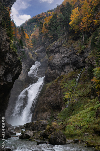 Cascada Del Estrecho ( Estrecho waterfall) in Ordesa valley, in Autumn season, Heusca, Spain