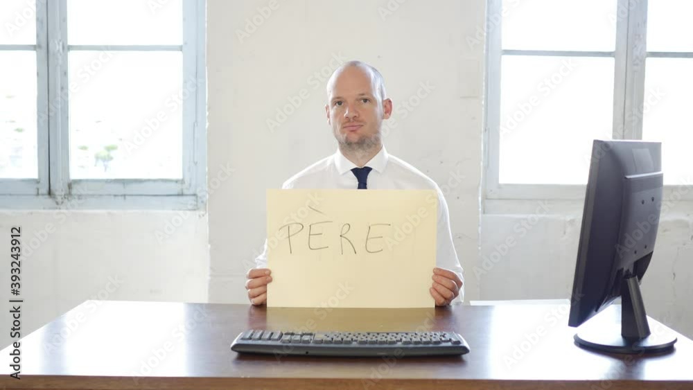 Handsome french caucasian worker with signs messages in french: (father, husband, welcome, Thank you, Hero) Père, Mari, Bienvenue, Merci, Héros,
