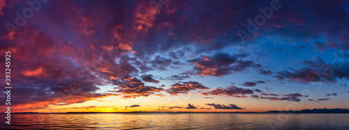 Beautiful Panoramic View of colorful cloudscape during dramatic sunset. Taken in White Rock  Vancouver  British Columbia  Canada.