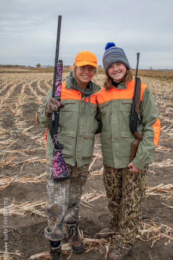 Pair of Sister Hunters looking for Pheasants in South Dakota