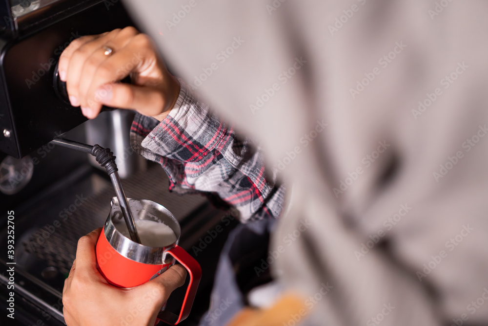 Fototapeta premium make a coffee with coffee machine in cafe