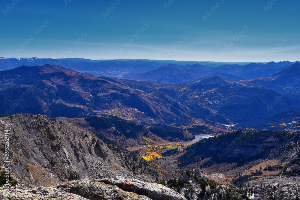View of mountain landscape from White Baldy and Pfeifferhorn trail, Box Elder and Mill Canyon Peak, American Fork Canyon and Silver Lake in fall, Wasatch Rocky mountain range, Utah, United States. 