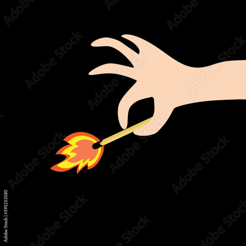 Hand holds a burning match on a black background.