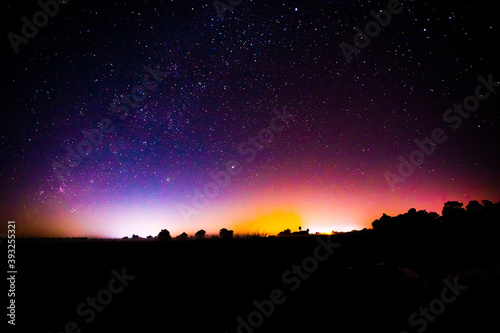 Night scenery with colorful and light yellow Milky Way Full of stars in the sky.