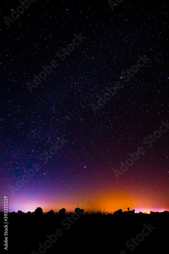 Night scenery with colorful and light yellow Milky Way Full of stars in the sky.