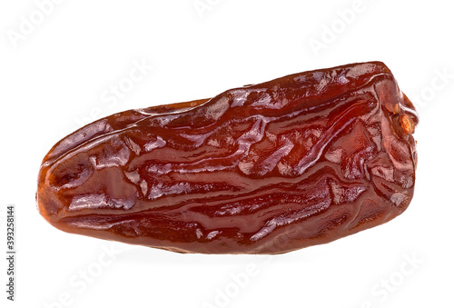 Single dried date fruit isolated on a white background