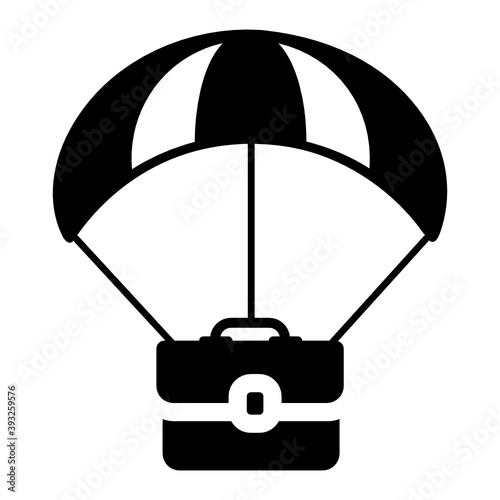 
Business travel icon, portfolio with parachute 
