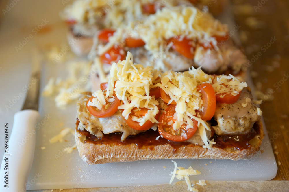 Making Chicken Tomato Sandwiches with Barberu Sauce.