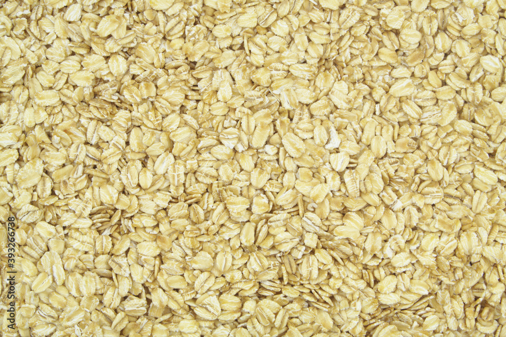 Rolled oats background, oat flakes texture Rolled oats background, oat flakes texture