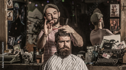 Bearded man in barber shop. Work in the barber shop