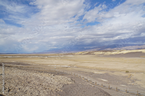 Wide open expanses and terrain at Death Valley National Park on a stormy and cloudy day