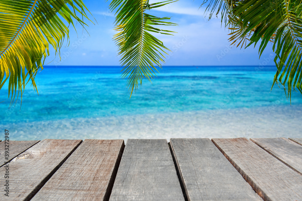 Wooden floor or plank on sea in summer. For product display.Calm Sea and Blue Sky Background.