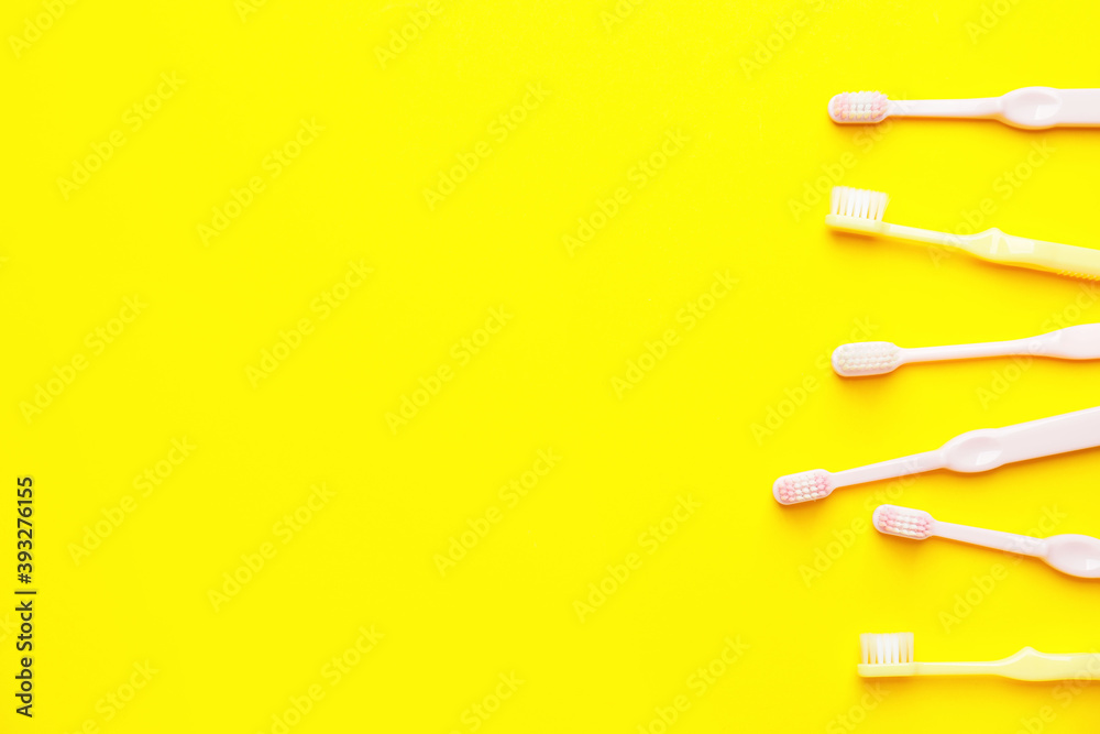 Tooth brushes on color background Tooth brushes on color background