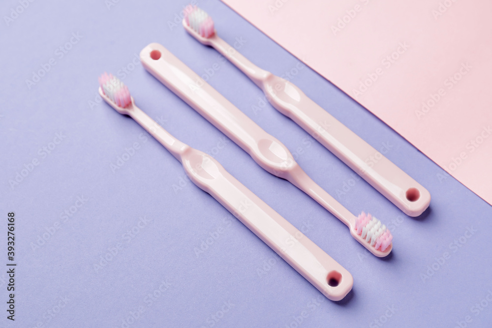 Toothbrushes on color background Toothbrushes on color background