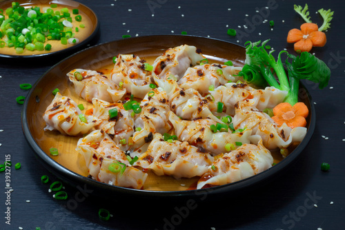 Dumplings with Asian pork and Vegetables recipe with a spicy Sauce
