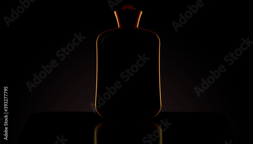 Hot water bottle on black background photo